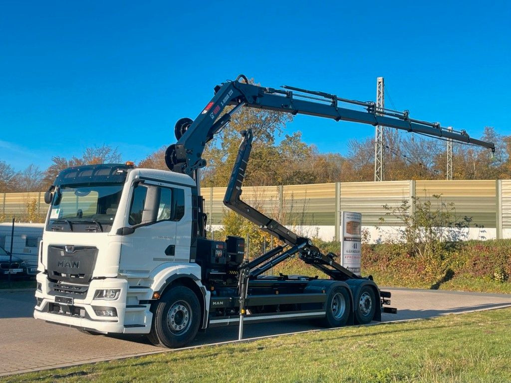 MAN TGS 26.470 6x2 Abrollkipper + Kran Hiab 228-6 - شاحنة ذات خطاف, شاحنة كرين: صورة 1 MAN TGS 26.470 6x2 Abrollkipper + Kran Hiab 228-6 - شاحنة ذات خطاف, شاحنة كرين: صورة 1