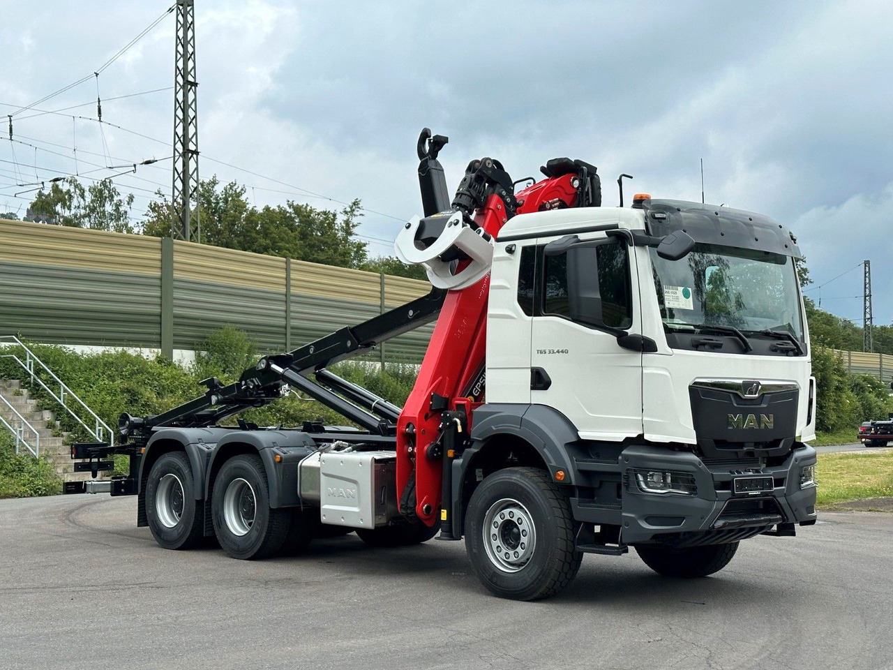 MAN TGS 33.440 6x4 Epsilon 170Z MultiLift 20s56 - شاحنة ذات خطاف, شاحنة كرين: صورة 1 MAN TGS 33.440 6x4 Epsilon 170Z MultiLift 20s56 - شاحنة ذات خطاف, شاحنة كرين: صورة 1