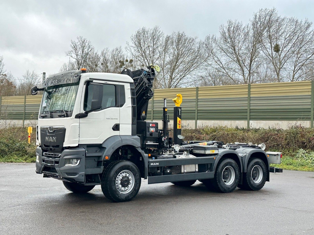 MAN TGS 33.440 6x6 BB Abrollkipper+Kran Hiab 228-6 - شاحنة ذات خطاف, شاحنة كرين: صورة 3 MAN TGS 33.440 6x6 BB Abrollkipper+Kran Hiab 228-6 - شاحنة ذات خطاف, شاحنة كرين: صورة 3