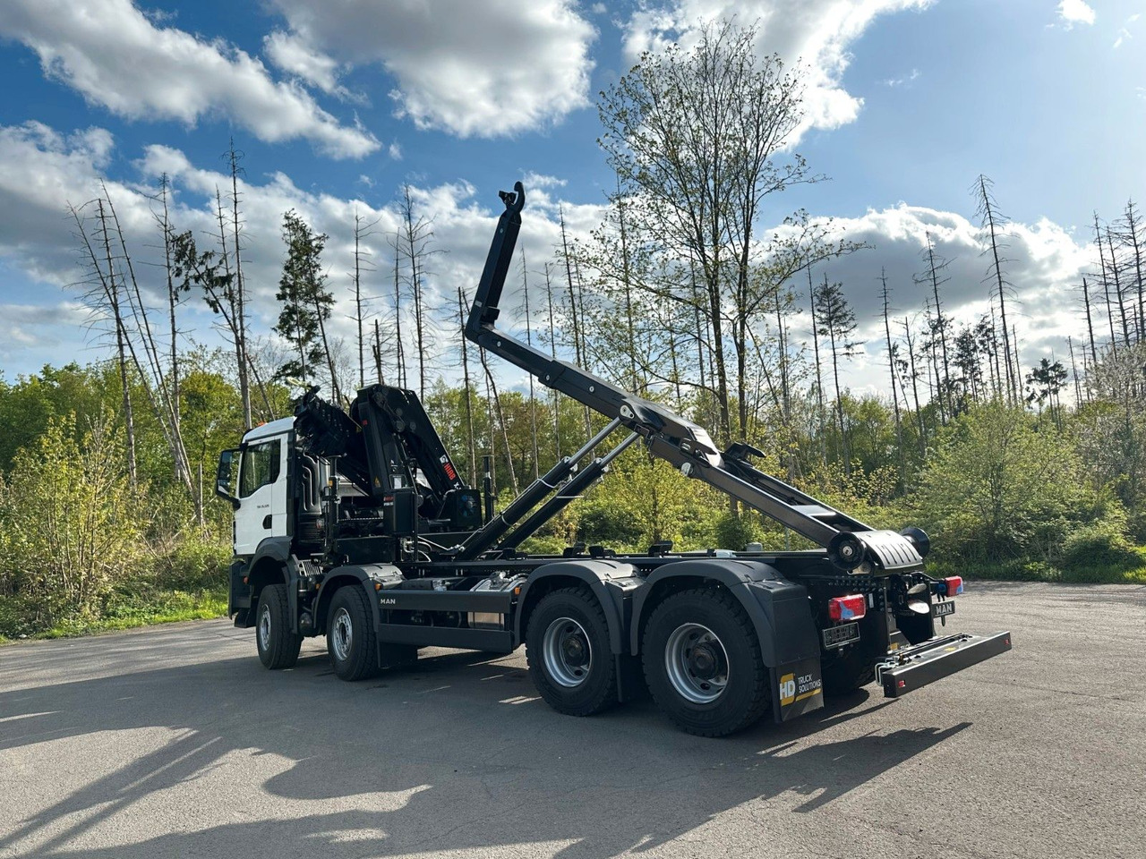 MAN TGS 35.520 8x4 Abrollkipper + Kran HIAB 228-6 - شاحنة ذات خطاف, شاحنة كرين: صورة 2 MAN TGS 35.520 8x4 Abrollkipper + Kran HIAB 228-6 - شاحنة ذات خطاف, شاحنة كرين: صورة 2