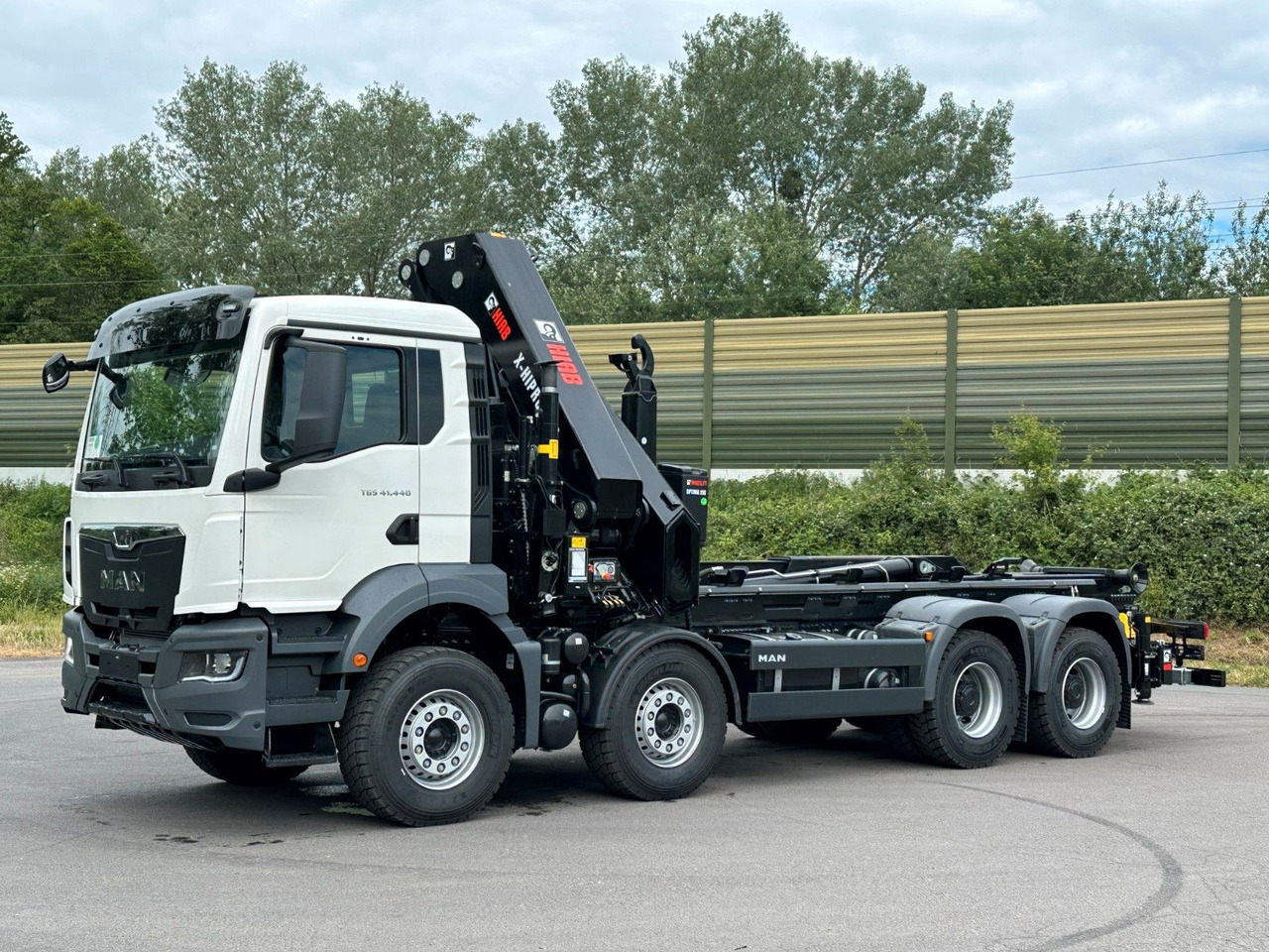 MAN TGS 35.520 8x4 Abrollkipper + Kran HIAB 658E6 - شاحنة ذات خطاف, شاحنة كرين: صورة 3 MAN TGS 35.520 8x4 Abrollkipper + Kran HIAB 658E6 - شاحنة ذات خطاف, شاحنة كرين: صورة 3
