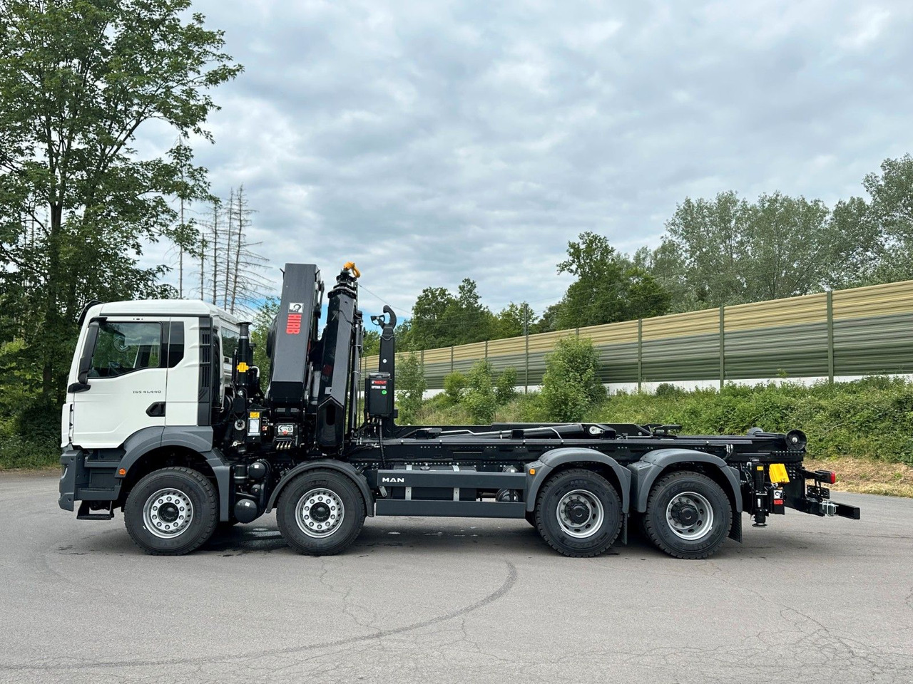 MAN TGS 35.520 8x4 Abrollkipper + Kran HIAB 658E6 - شاحنة ذات خطاف, شاحنة كرين: صورة 4 MAN TGS 35.520 8x4 Abrollkipper + Kran HIAB 658E6 - شاحنة ذات خطاف, شاحنة كرين: صورة 4