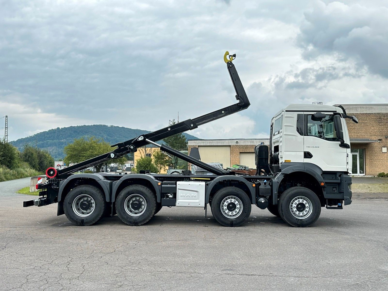شاحنة ذات خطاف MAN TGS 35.520 8x4 Euro6e MultiLift 25s59: صورة 7