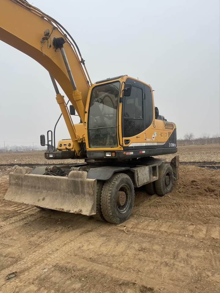 Original Good Quality USED Excavators R210 W-9T 21 Ton Excavator Wheel Excavator for HYUNDAI - حفارة دولاب: صورة 2 Original Good Quality USED Excavators R210 W-9T 21 Ton Excavator Wheel Excavator for HYUNDAI - حفارة دولاب: صورة 2