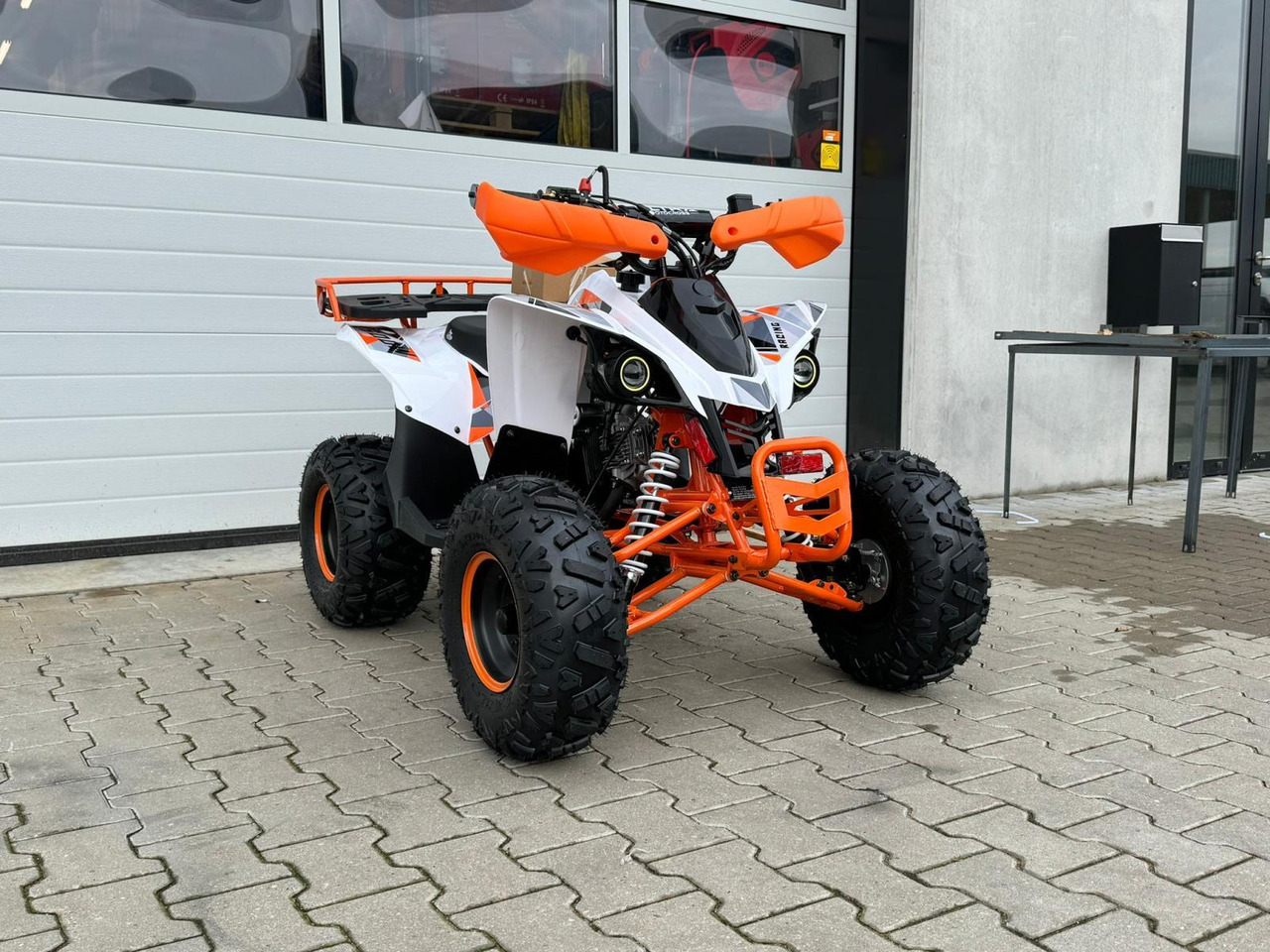 Quad UltraMotocross 125cc (oranje) - مركبة لجميع التضاريس: صورة 2 Quad UltraMotocross 125cc (oranje) - مركبة لجميع التضاريس: صورة 2