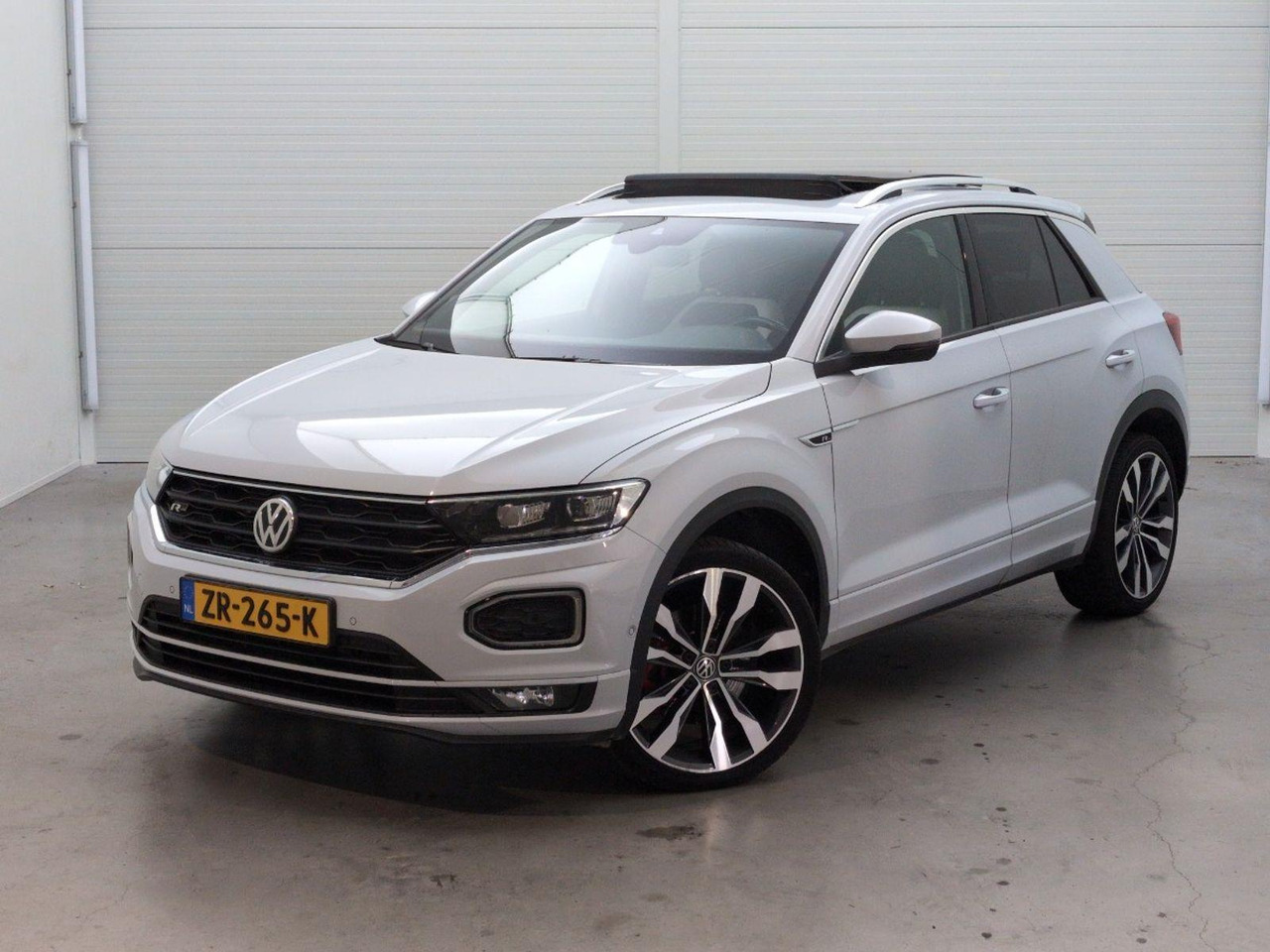 سيارة دفع رباعي Volkswagen T-Roc 1.5 TSI Sport Business R | 2019 | 121.700 km | Automaat | ZR265K | NAP: Logisch: صورة 1