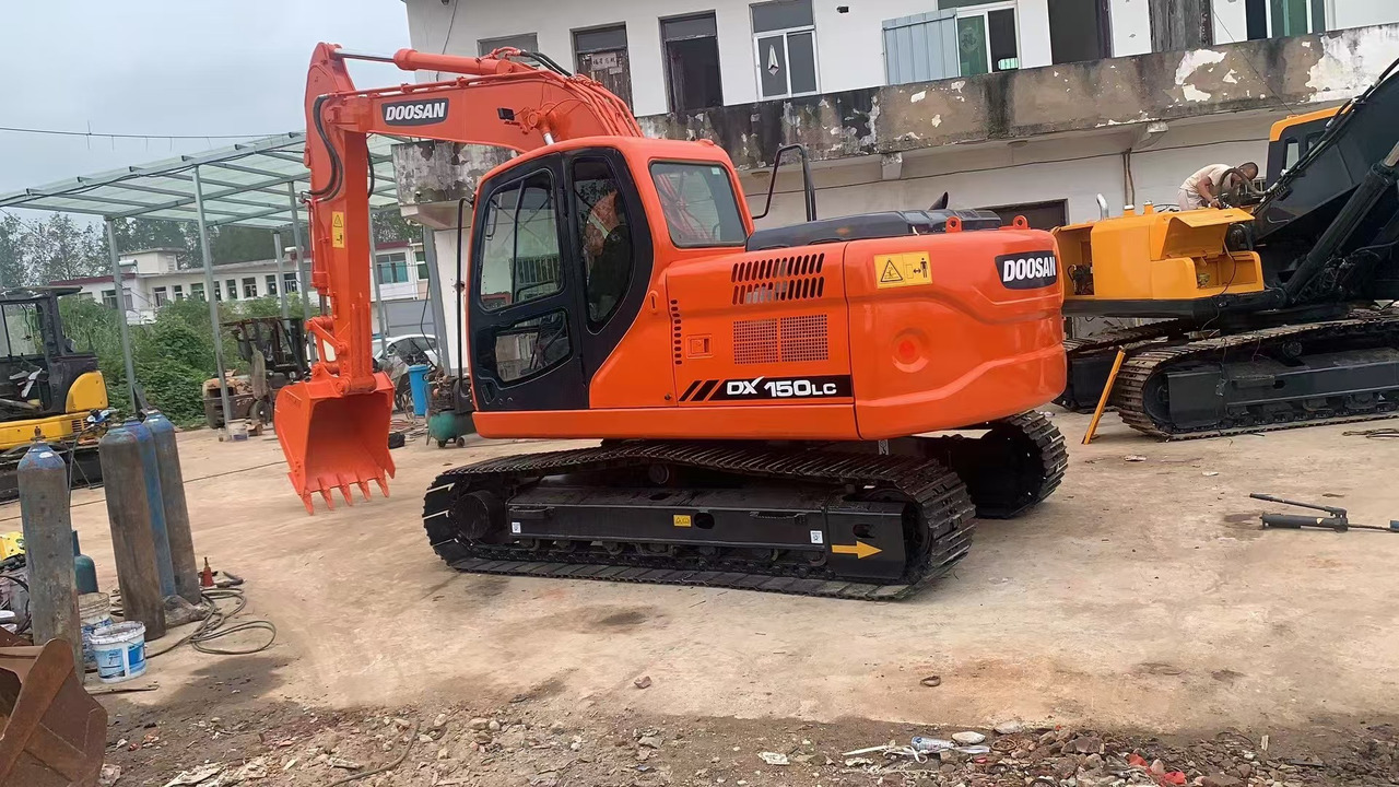 DOOSAN DX150 - حفار زحاف: صورة 1 DOOSAN DX150 - حفار زحاف: صورة 1