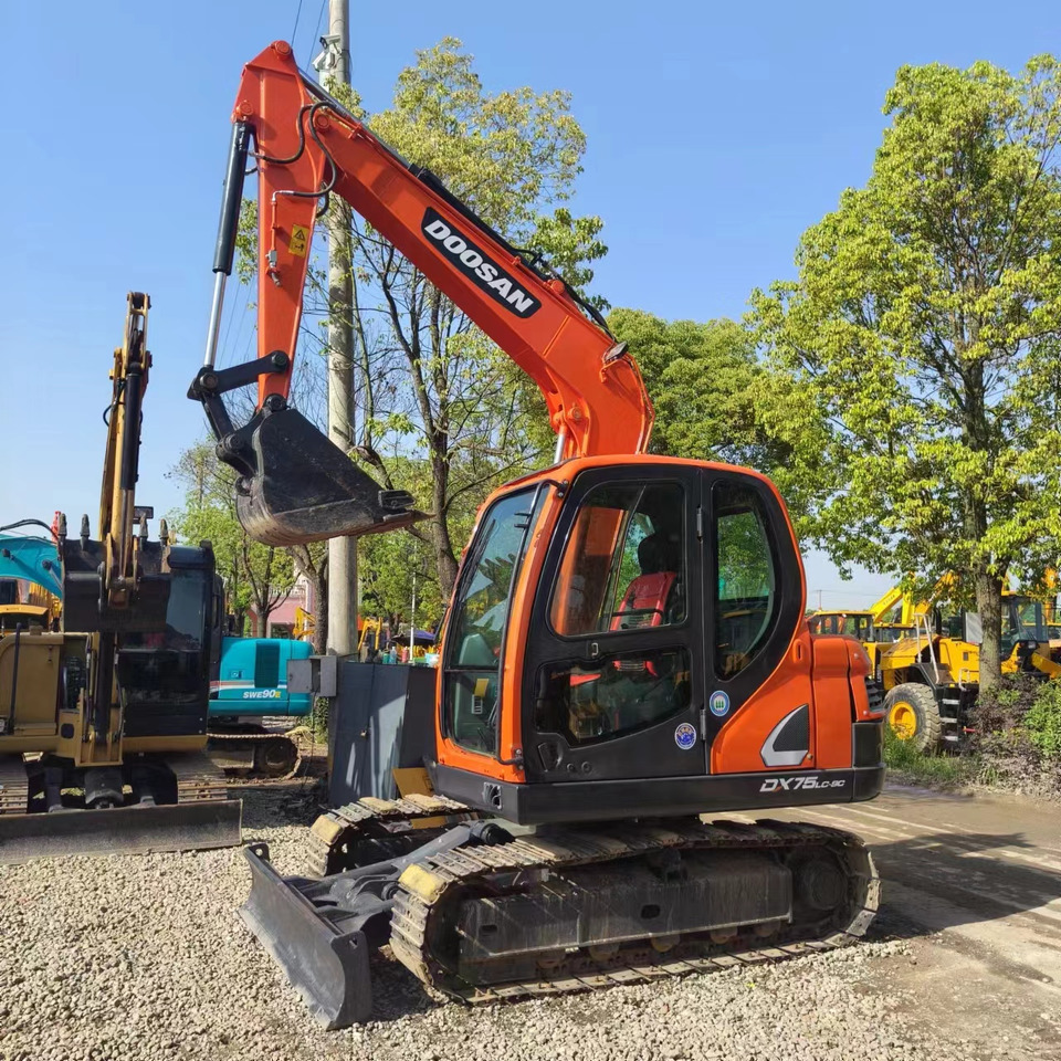 DOOSAN DX75 - حفار زحاف: صورة 1 DOOSAN DX75 - حفار زحاف: صورة 1
