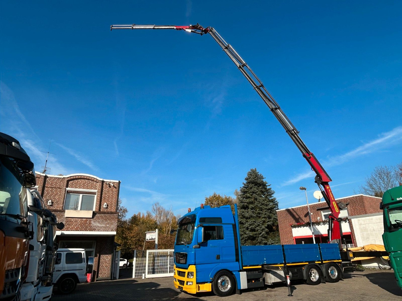 MAN 26.440 TGX Pritsche + PK 34002 + JIB Seilwinde - شاحنة كرين: صورة 1 MAN 26.440 TGX Pritsche + PK 34002 + JIB Seilwinde - شاحنة كرين: صورة 1