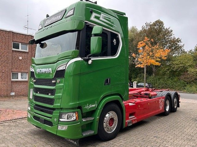 Scania S580 V8 MEILLER Abroller  mit Lift+Lenkachse 6x2 - شاحنة ذات خطاف: صورة 1 Scania S580 V8 MEILLER Abroller  mit Lift+Lenkachse 6x2 - شاحنة ذات خطاف: صورة 1