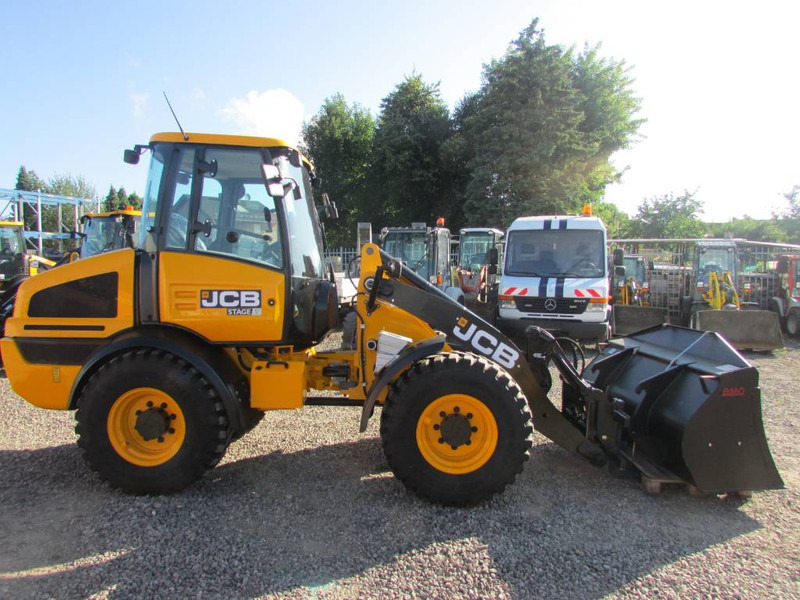 JCB 409 Radlader 47.500 EUR - اللودر بعجل: صورة 1 JCB 409 Radlader 47.500 EUR - اللودر بعجل: صورة 1
