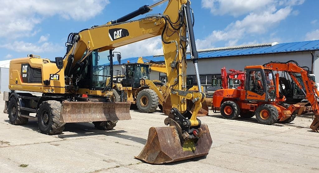 CAT M316F - حفارة دولاب: صورة 1 CAT M316F - حفارة دولاب: صورة 1