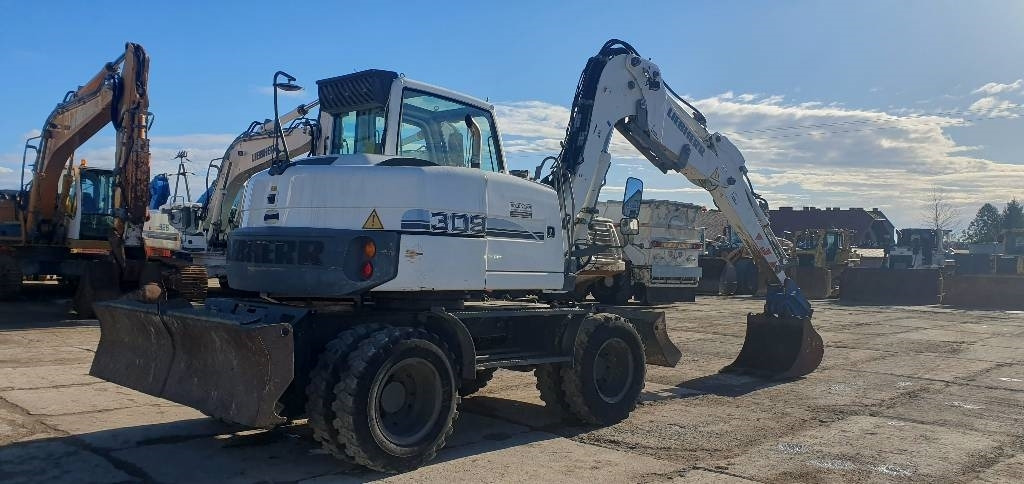 Liebherr A 309 Litronic - حفارة دولاب: صورة 3 Liebherr A 309 Litronic - حفارة دولاب: صورة 3