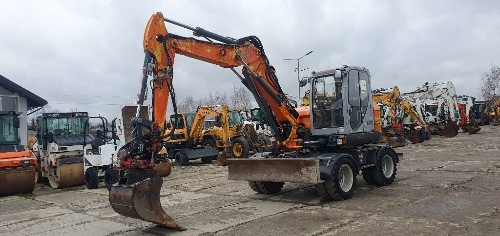 Wacker Neuson Ew100 z rototiltem - حفارة دولاب: صورة 1 Wacker Neuson Ew100 z rototiltem - حفارة دولاب: صورة 1