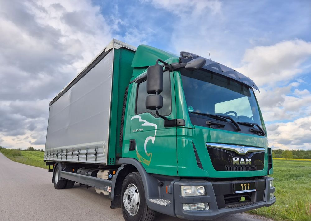 MAN TGL 12.250 6.2m AUTOMAT KLIMA z Niemiec ESP nowe opony EURO 6 / 4.75 rozstaw / zawiesie na wózek widłowy / TOP STAN / okazja nauka jazdy MOŻLIWOŚĆ DOSTOSOWANIA 12t - شاحنة ستارة: صورة 1 MAN TGL 12.250 6.2m AUTOMAT KLIMA z Niemiec ESP nowe opony EURO 6 / 4.75 rozstaw / zawiesie na wózek widłowy / TOP STAN / okazja nauka jazdy MOŻLIWOŚĆ DOSTOSOWANIA 12t - شاحنة ستارة: صورة 1
