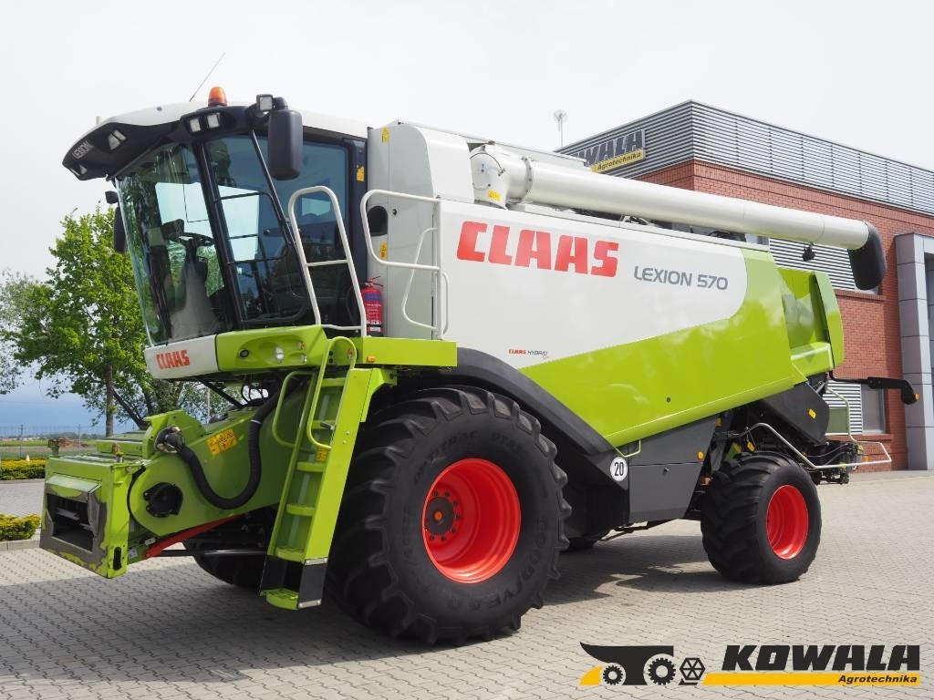 Claas Lexion 570 4WD + V750 - حصادة موحَّدة: صورة 1 Claas Lexion 570 4WD + V750 - حصادة موحَّدة: صورة 1