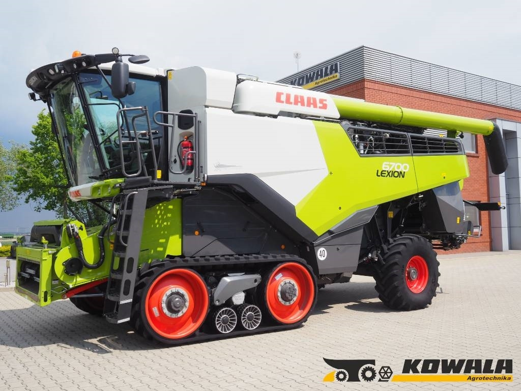 Claas Lexion 6700TT GPS + V930 - حصادة موحَّدة: صورة 1 Claas Lexion 6700TT GPS + V930 - حصادة موحَّدة: صورة 1