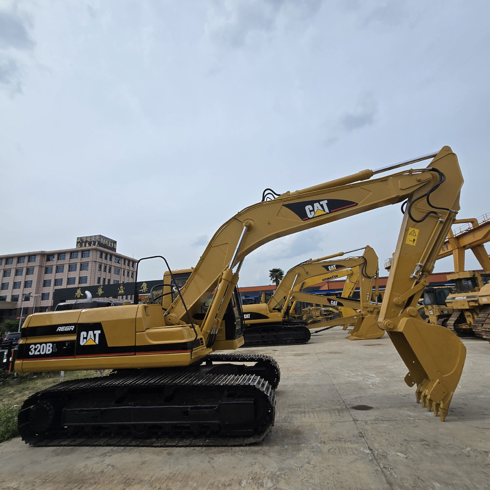 CATERPILLAR 320BL - حفار زحاف: صورة 1 CATERPILLAR 320BL - حفار زحاف: صورة 1