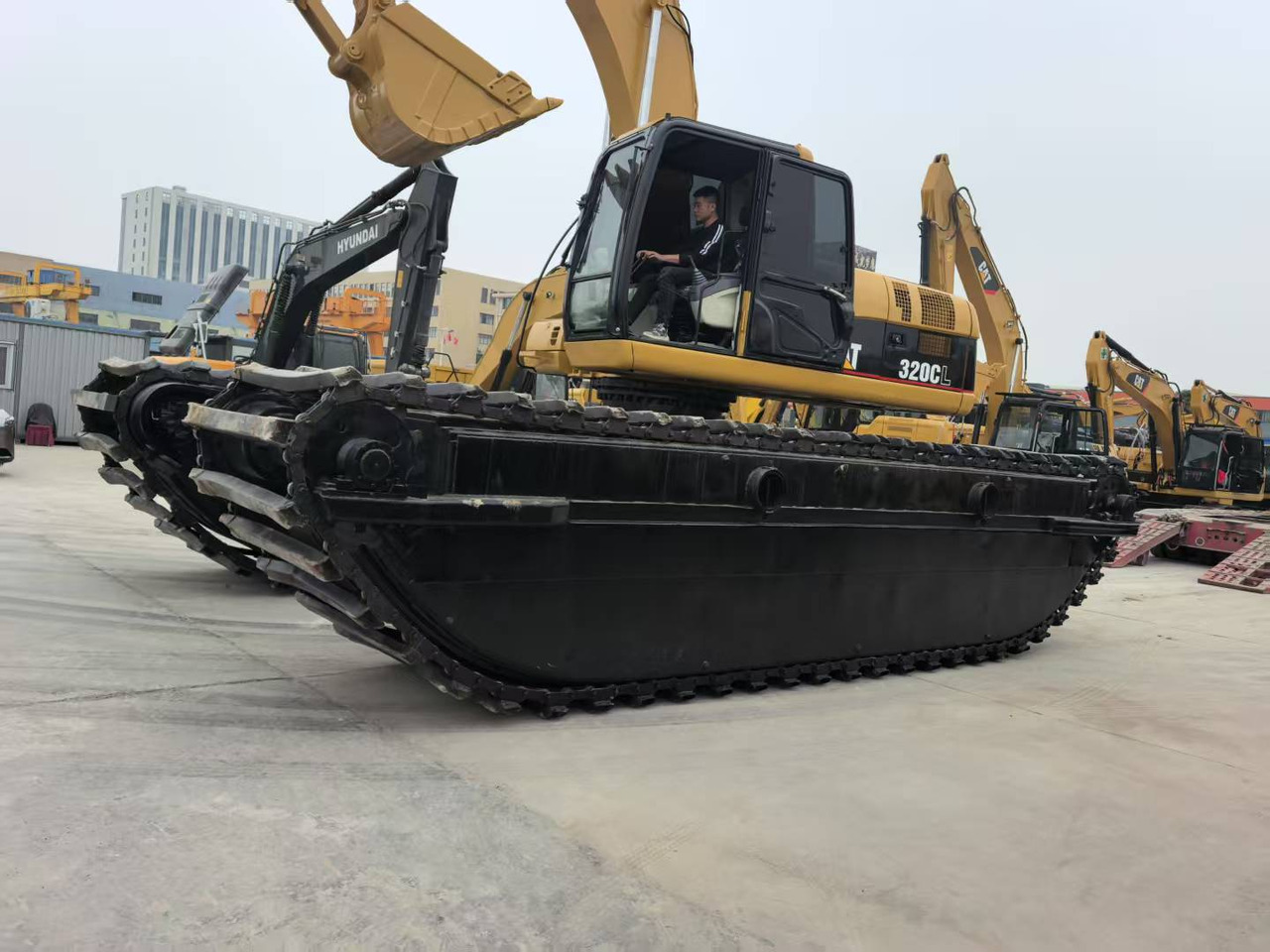 CATERPILLAR 320C boat excavator - حفارة أفقية: صورة 2 CATERPILLAR 320C boat excavator - حفارة أفقية: صورة 2