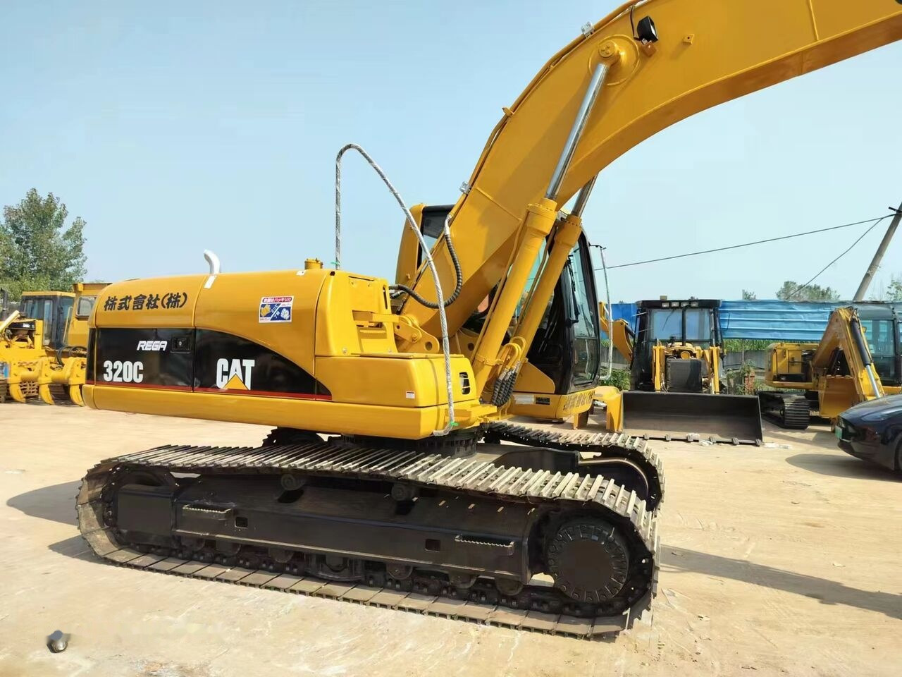 Caterpillar 320C - حفار زحاف: صورة 1 Caterpillar 320C - حفار زحاف: صورة 1