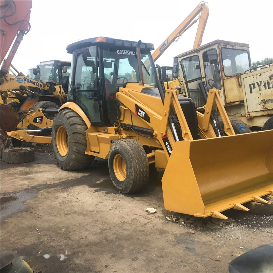 Caterpillar 430F - جرافة حفار: صورة 1 Caterpillar 430F - جرافة حفار: صورة 1