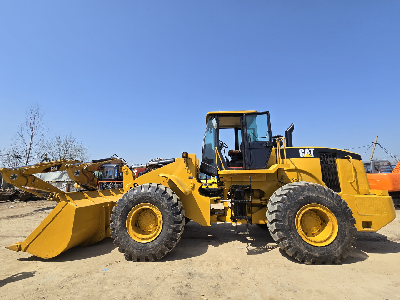 Caterpillar 966G - اللودر بعجل: صورة 1 Caterpillar 966G - اللودر بعجل: صورة 1
