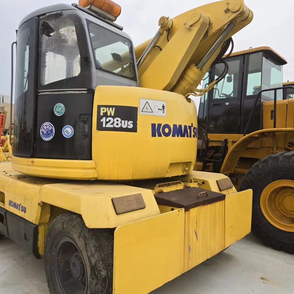 KOMATSU PC128US - حفارة دولاب: صورة 4 KOMATSU PC128US - حفارة دولاب: صورة 4