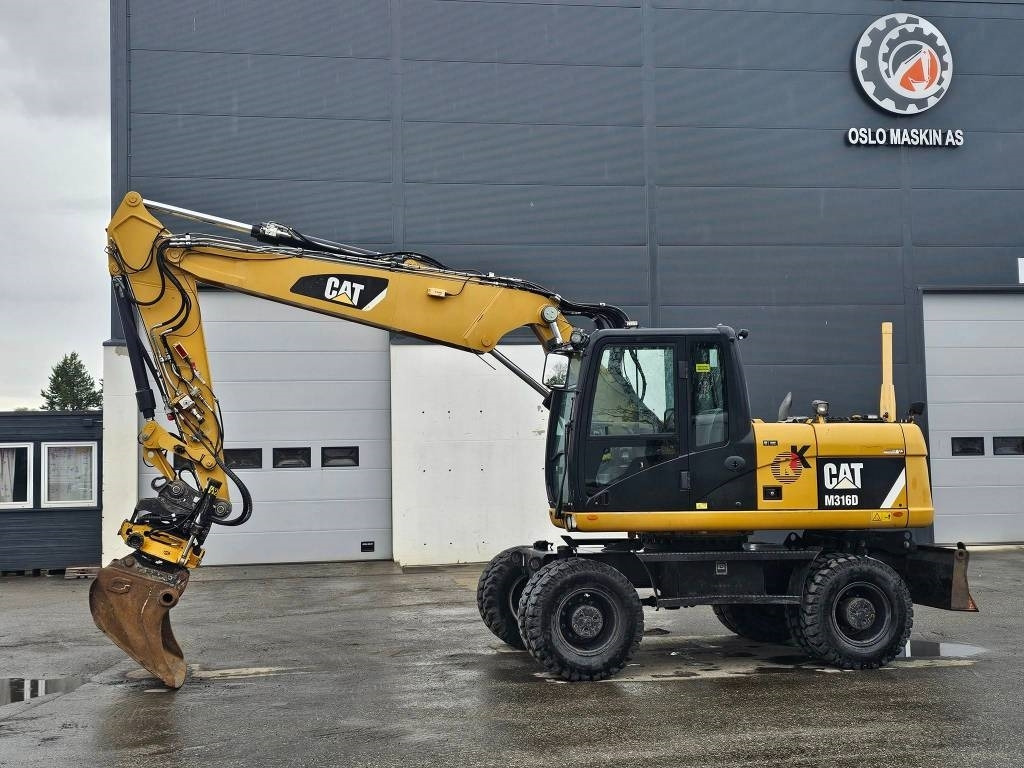 CAT M 316 D - حفارة دولاب: صورة 2 CAT M 316 D - حفارة دولاب: صورة 2