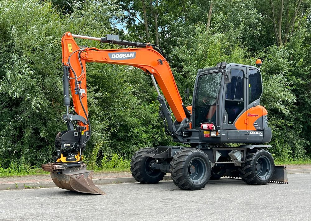 Doosan DOOSAN DX57W *ROTOTILT* 2200 Motogodzin JAK NOWA KOPARKA KOŁOWA STAN PERFEKCYJNY SPROWADZONA - حفارة دولاب: صورة 1 Doosan DOOSAN DX57W *ROTOTILT* 2200 Motogodzin JAK NOWA KOPARKA KOŁOWA STAN PERFEKCYJNY SPROWADZONA - حفارة دولاب: صورة 1