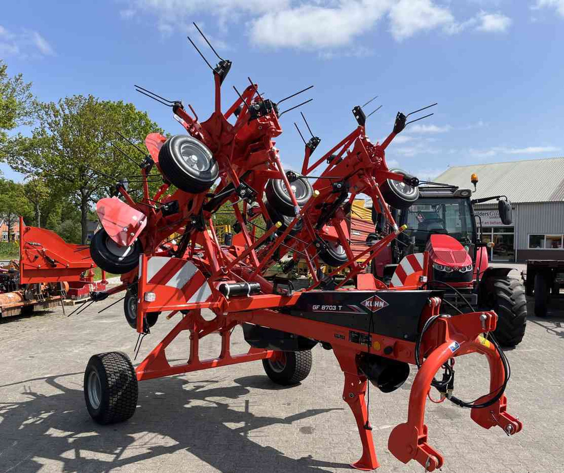 Kuhn GF8703T Schudder Tedder Kreiselheuer weidebouwmachines - آلة تيبيس العشب/ آلة جمع العشب: صورة 2 Kuhn GF8703T Schudder Tedder Kreiselheuer weidebouwmachines - آلة تيبيس العشب/ آلة جمع العشب: صورة 2