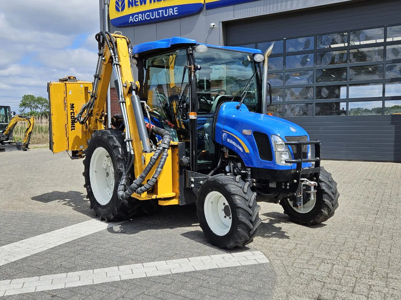 New Holland Boomer 3050 met Bos Maaiarm - جرار صغير: صورة 1 New Holland Boomer 3050 met Bos Maaiarm - جرار صغير: صورة 1