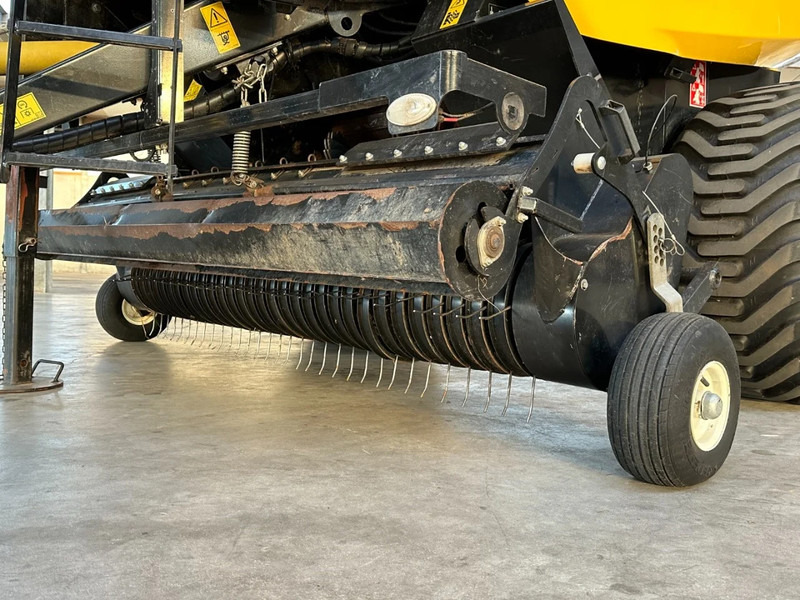 New Holland Roll baler 125 - حصادة: صورة 4 New Holland Roll baler 125 - حصادة: صورة 4