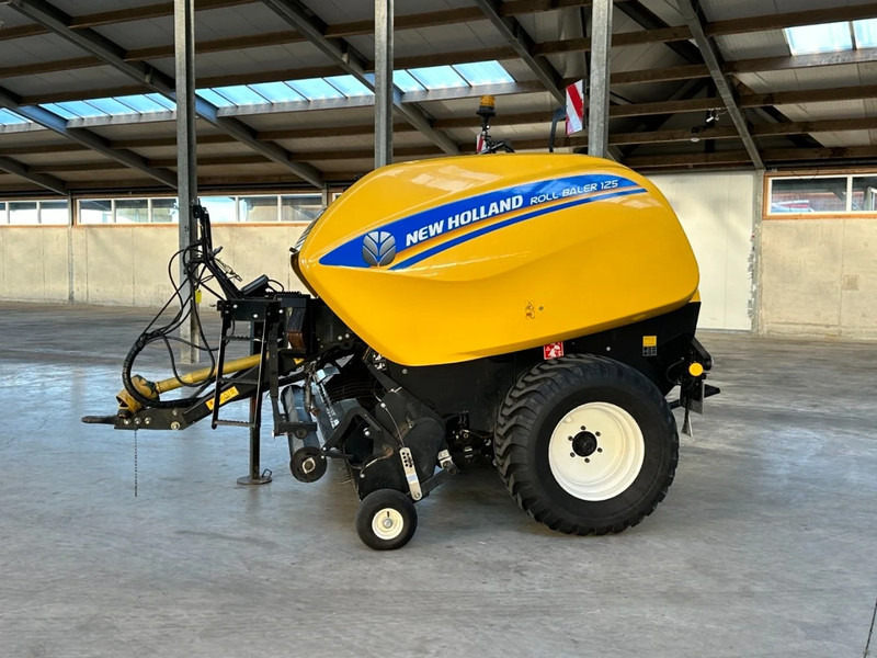 New Holland Roll baler 125 - حصادة: صورة 2 New Holland Roll baler 125 - حصادة: صورة 2