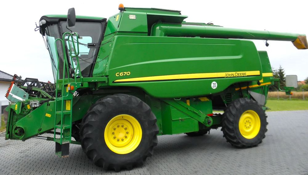 John Deere C 670 2008 Rok, heder 7,6m, 1900 mtg, Nie Malowany, Stan Idealny - حصادة موحَّدة: صورة 1 John Deere C 670 2008 Rok, heder 7,6m, 1900 mtg, Nie Malowany, Stan Idealny - حصادة موحَّدة: صورة 1