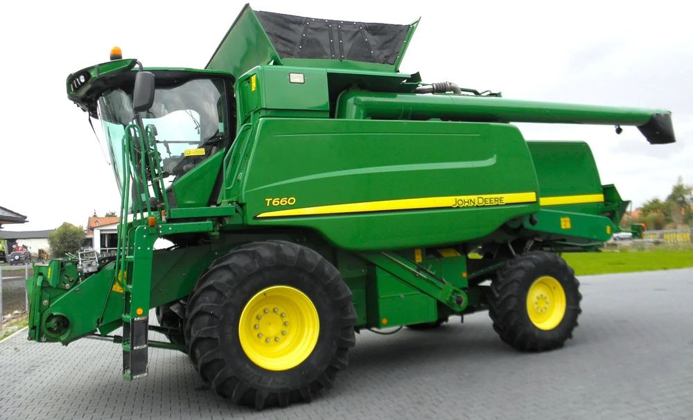 John Deere T660 2014 Rok, heder 7,6m, 2700 mtg na silniku, Najbogatsza Wersja, Nie Malowany, Stan Idealny - حصادة موحَّدة: صورة 1 John Deere T660 2014 Rok, heder 7,6m, 2700 mtg na silniku, Najbogatsza Wersja, Nie Malowany, Stan Idealny - حصادة موحَّدة: صورة 1