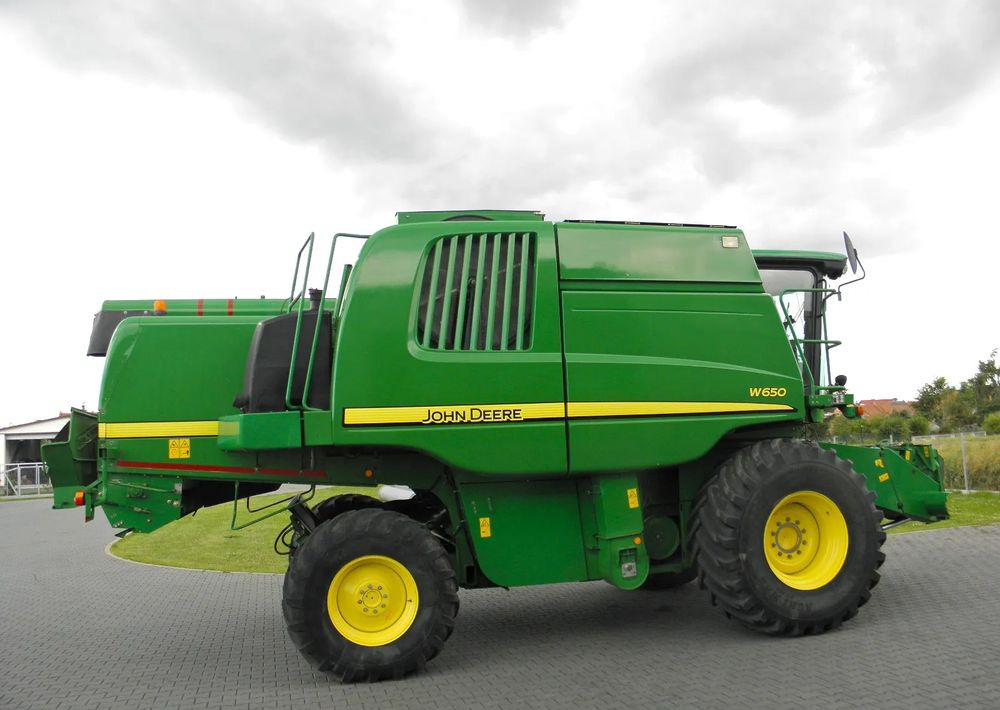 John Deere W650 2008 Rok, heder 6,7m, Nie Malowany, Stan Bardzo Dobry - حصادة موحَّدة: صورة 5 John Deere W650 2008 Rok, heder 6,7m, Nie Malowany, Stan Bardzo Dobry - حصادة موحَّدة: صورة 5