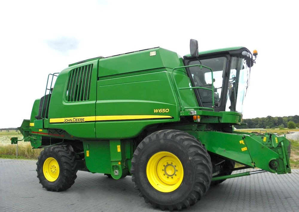 John Deere W650 2008 Rok, heder 6,7m, Nie Malowany, Stan Bardzo Dobry - حصادة موحَّدة: صورة 2 John Deere W650 2008 Rok, heder 6,7m, Nie Malowany, Stan Bardzo Dobry - حصادة موحَّدة: صورة 2