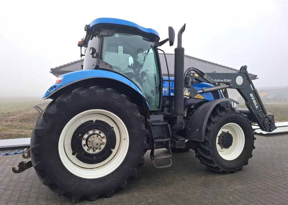 New Holland T7050 2011 Rok 9400 mtg, AutoCommand, Ładowacz czołowy Stoll, Nie Malowany, Stan Idelany New Holland T7050 2011 Rok 9400 mtg, AutoCommand, Ładowacz czołowy Stoll, Nie Malowany, Stan Idelany: صورة 11