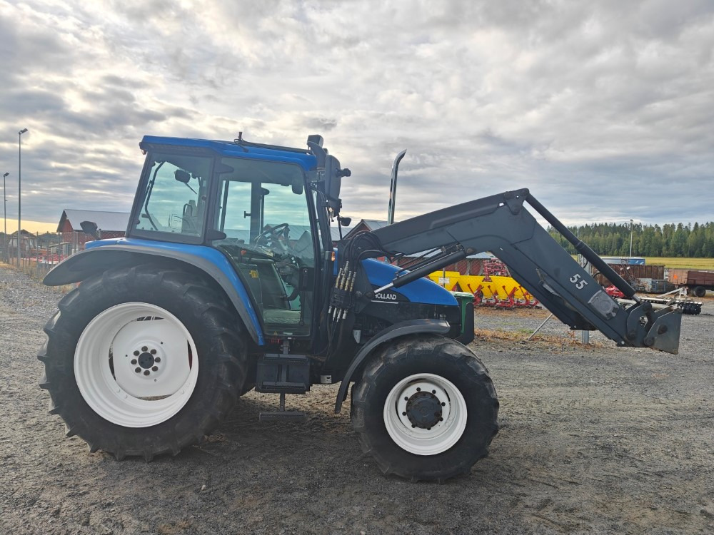 New Holland TS100, ES vaihteisto, ilmastointi, etukuormaaja Ålö Q55, katso video! - جرار: صورة 5 New Holland TS100, ES vaihteisto, ilmastointi, etukuormaaja Ålö Q55, katso video! - جرار: صورة 5
