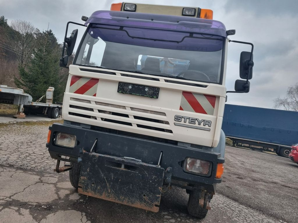 MAN (STEYR) 18.284 4x4 abrollkipper - شاحنة ذات خطاف: صورة 2 MAN (STEYR) 18.284 4x4 abrollkipper - شاحنة ذات خطاف: صورة 2