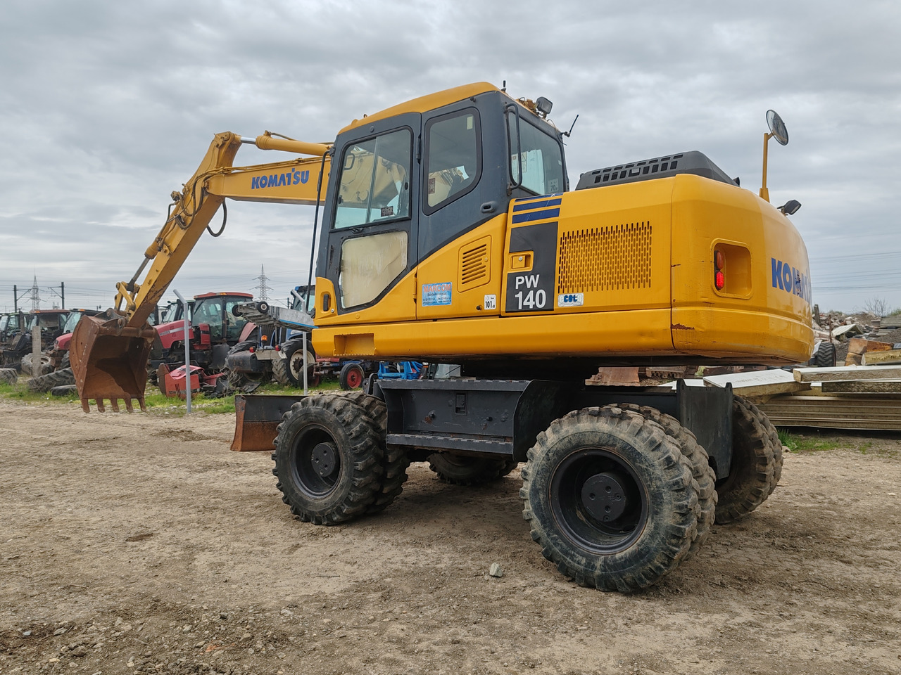Komatsu PW140-7 - حفارة دولاب: صورة 5 Komatsu PW140-7 - حفارة دولاب: صورة 5