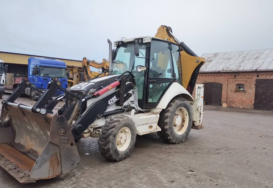 CAT Caterpillar 428E - جرافة حفار: صورة 1 CAT Caterpillar 428E - جرافة حفار: صورة 1