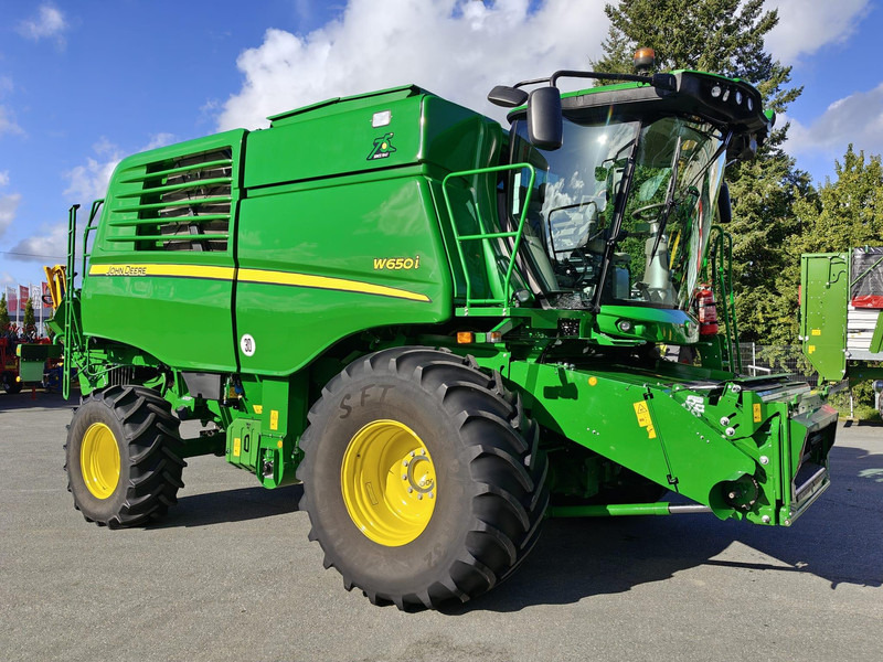 John Deere W650 i 722X - حصادة موحَّدة: صورة 1 John Deere W650 i 722X - حصادة موحَّدة: صورة 1