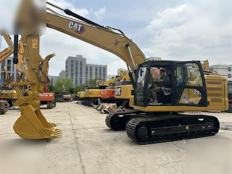 CATERPILLAR 320GC - حفار زحاف: صورة 1 CATERPILLAR 320GC - حفار زحاف: صورة 1