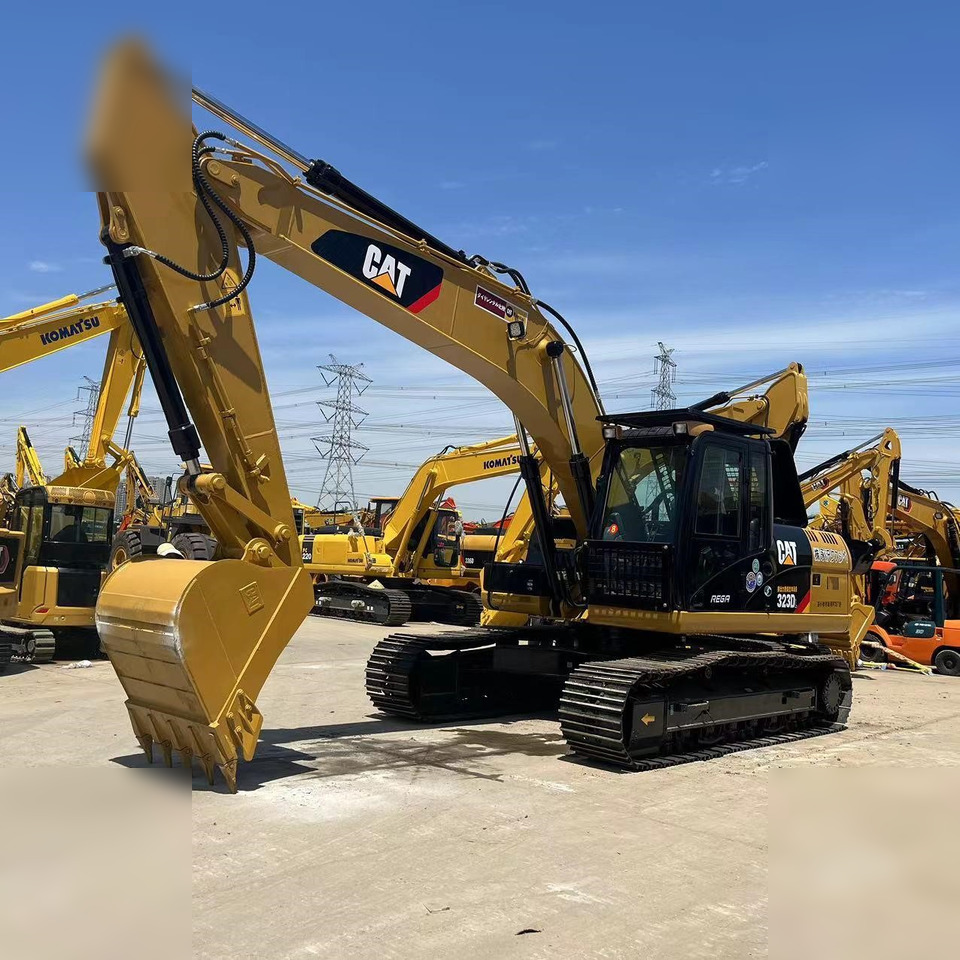 CATERPILLAR 323DL - حفار زحاف: صورة 1 CATERPILLAR 323DL - حفار زحاف: صورة 1