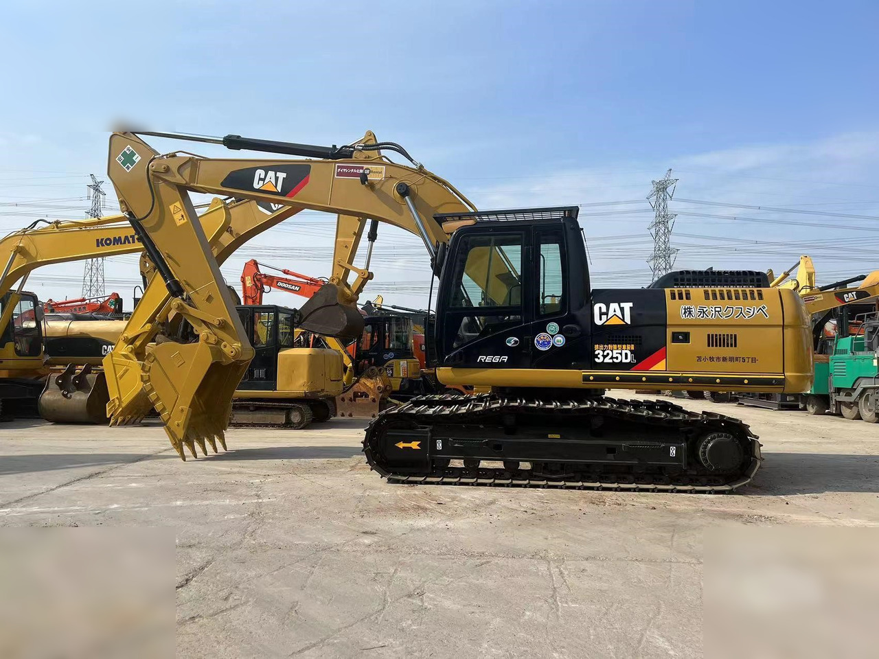 CATERPILLAR 325DL - حفار زحاف: صورة 1 CATERPILLAR 325DL - حفار زحاف: صورة 1