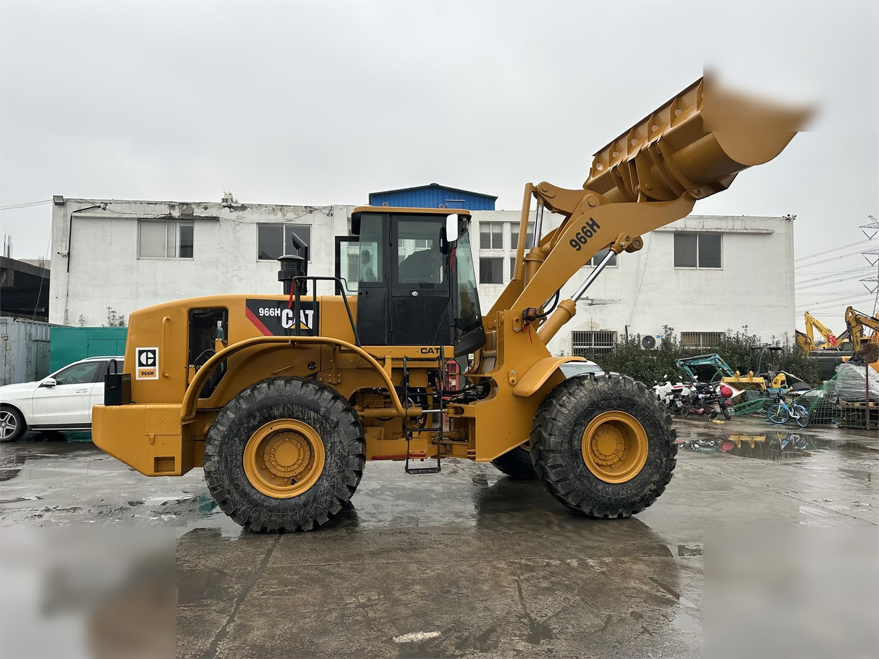 CATERPILLAR 966H - اللودر بعجل: صورة 1 CATERPILLAR 966H - اللودر بعجل: صورة 1