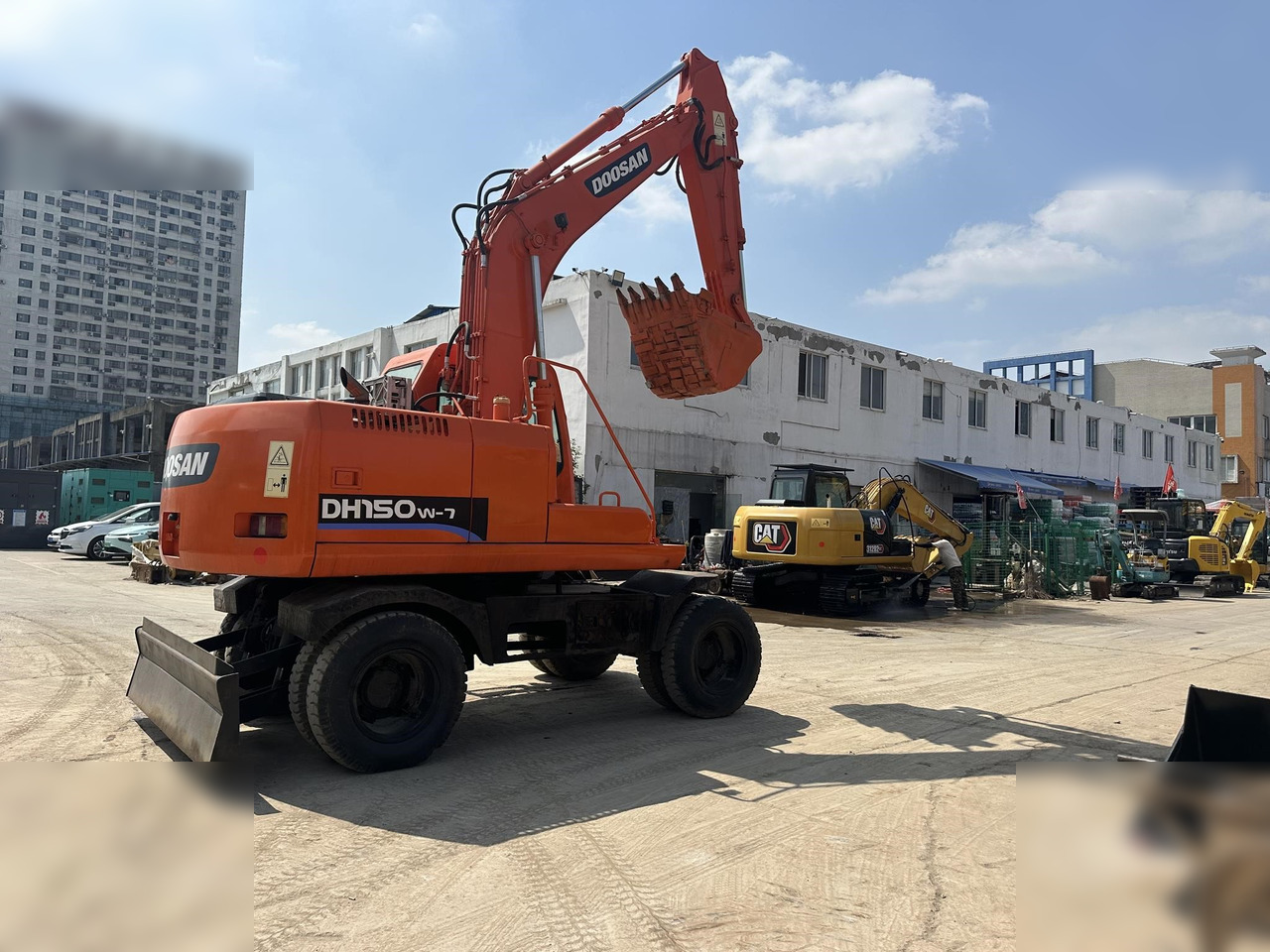 DOOSAN DH150W-7 - حفارة دولاب: صورة 1 DOOSAN DH150W-7 - حفارة دولاب: صورة 1