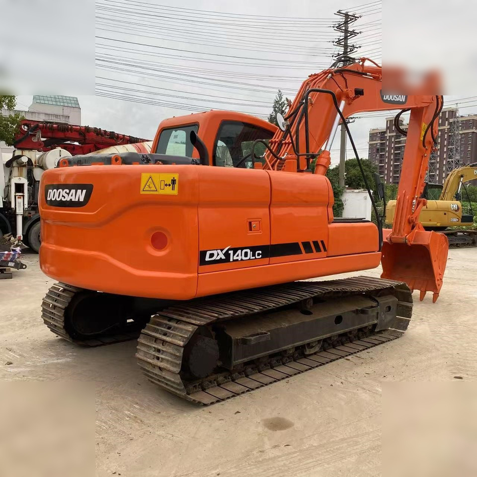 DOOSAN DX140 LC - حفار زحاف: صورة 1 DOOSAN DX140 LC - حفار زحاف: صورة 1