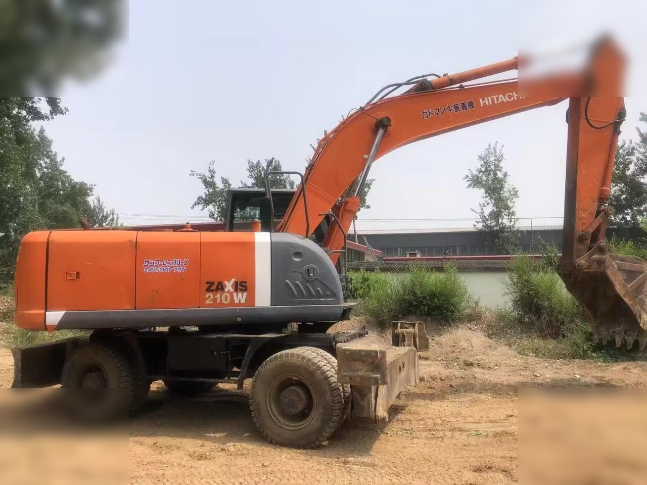 HITACHI ZX210W - حفارة دولاب: صورة 2 HITACHI ZX210W - حفارة دولاب: صورة 2